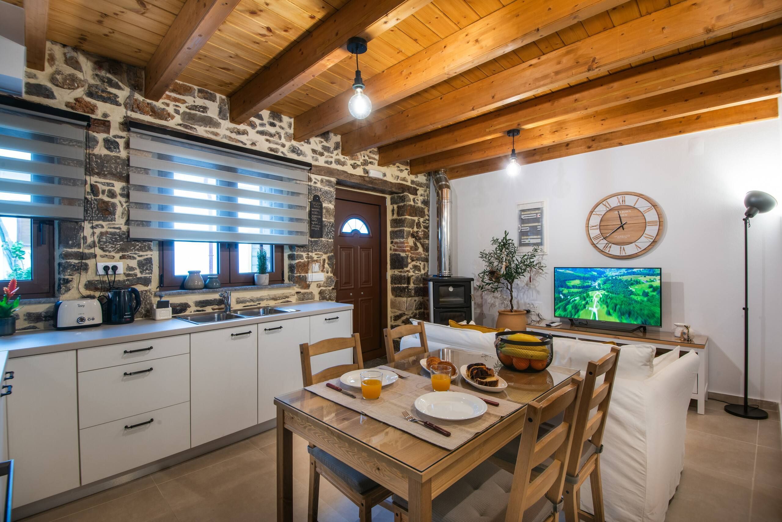 Breakfast table set in front of the stone wall